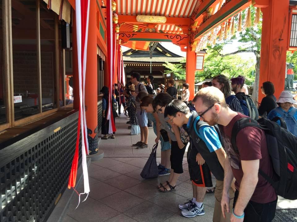 Asian Studies students abroad in Asia, bowing at temple