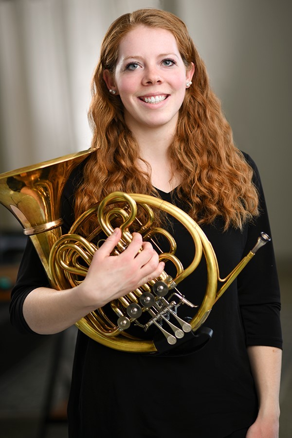 Aisling O'Sullivan with a french horn