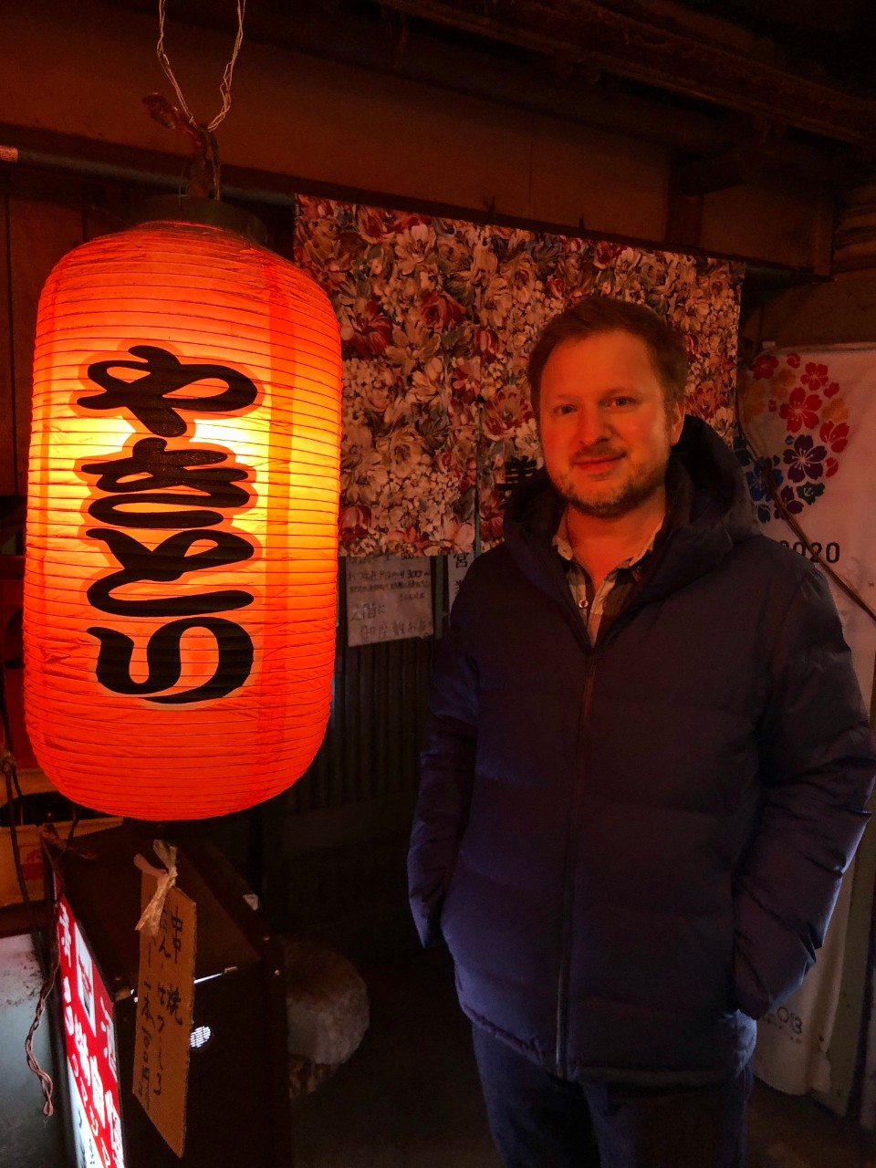Jonathan DeHart with an asian lantern