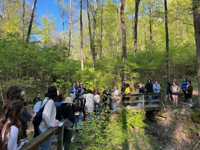 Large group of people participating in Hike+Write