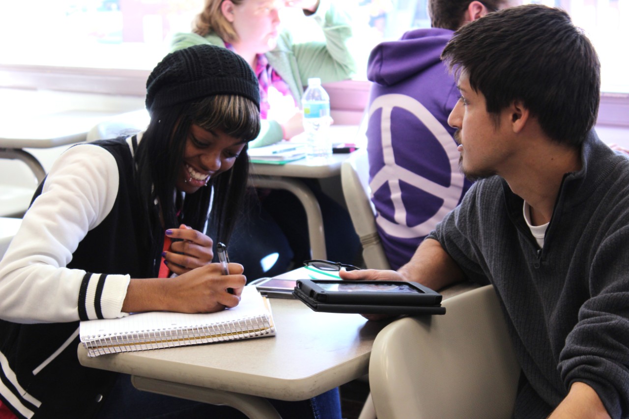 student taking notes