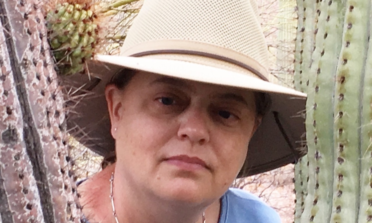 Prof. Rollmann in the desert with cactus