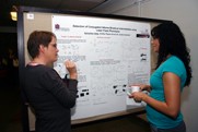 Students looking at poster
