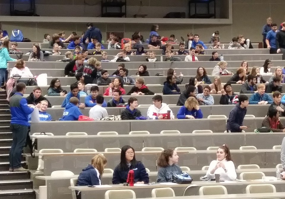 Math Bowl 2019 students working in a lecture hall