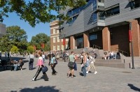 Photo of students walking around on class