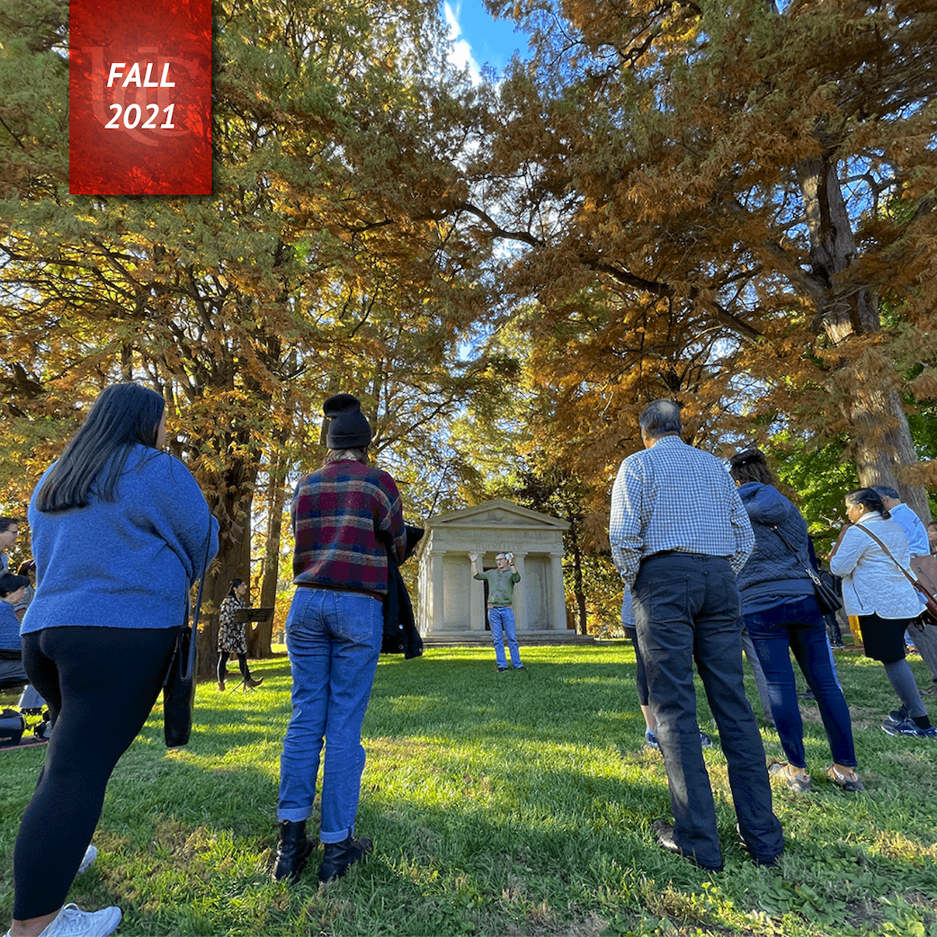Michael Griffith speaking to a crowd in from of a historic Spring Grove mausoleum.
