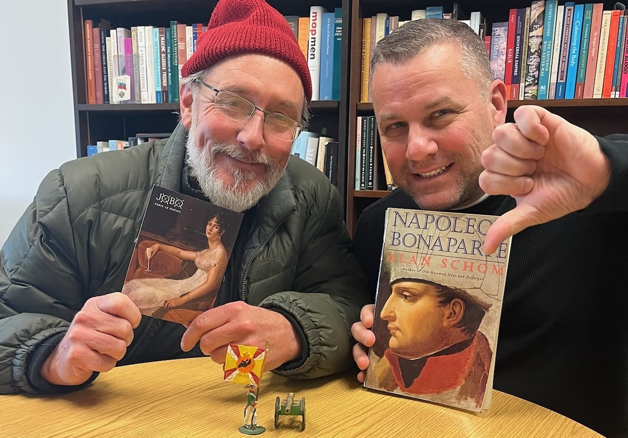 Photo of Jeff and Willard holding up Napoleon Books