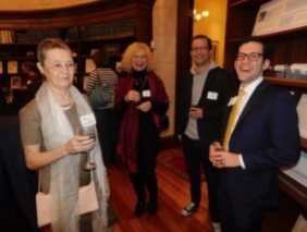 A group of people smiling at the camera