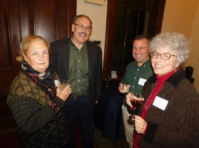 a group of people smiling at the camera