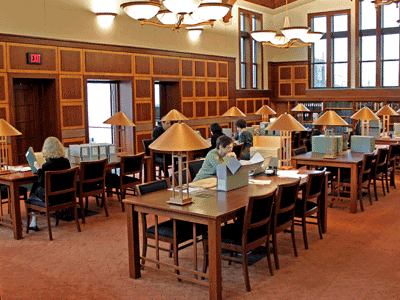 Room with chairs and tables, people researching
