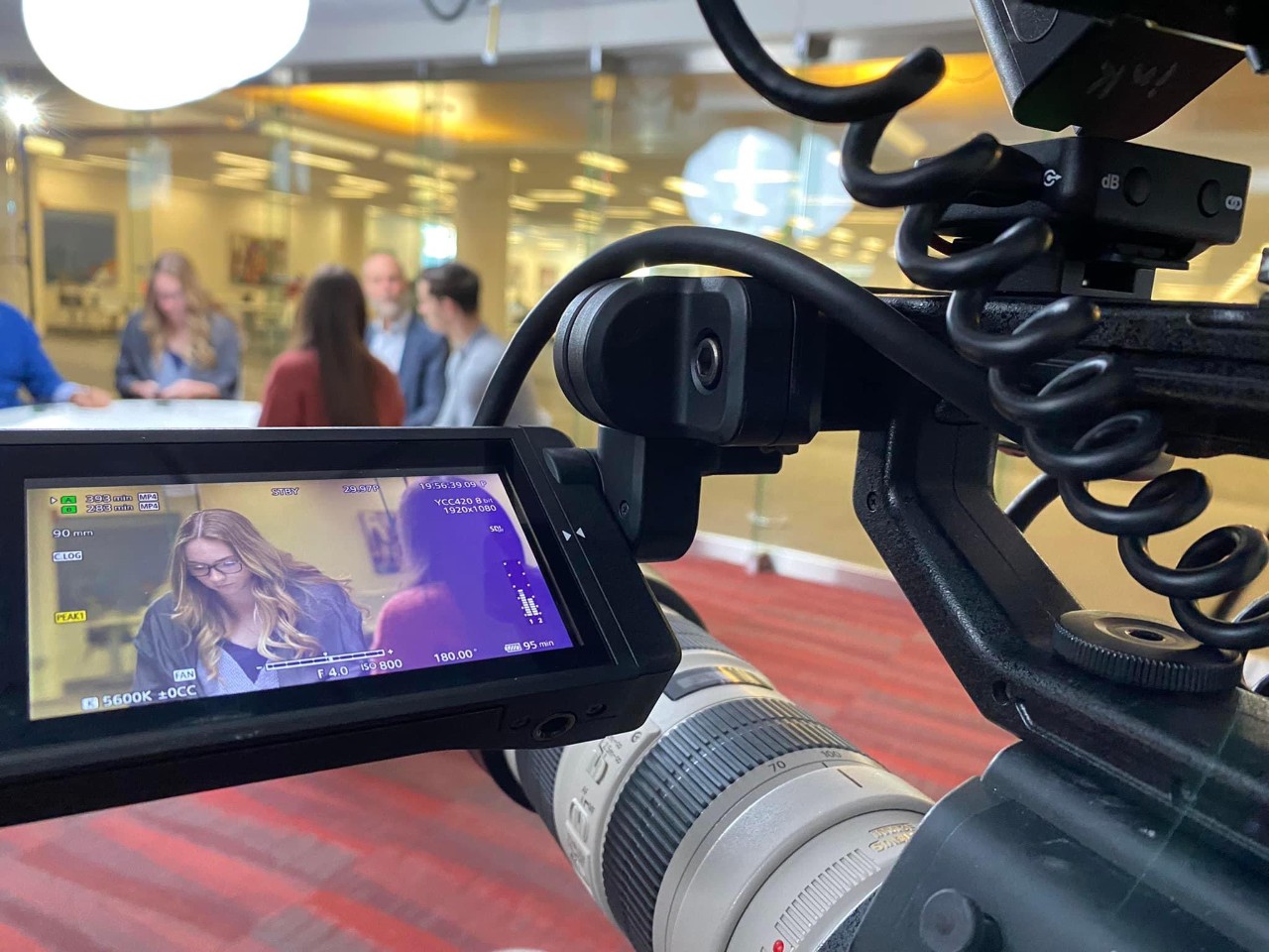 view of news broadcast from behind the camera