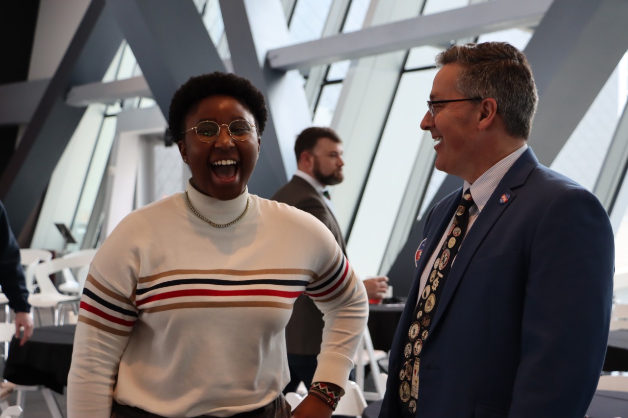 Student Janice Rotich with Dr. Richard Harknett.